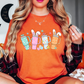 Retro Easter Tumblers Tee | Hoppin' Into Spring Collection | Unisex Pre-Shrunk T-Shirt